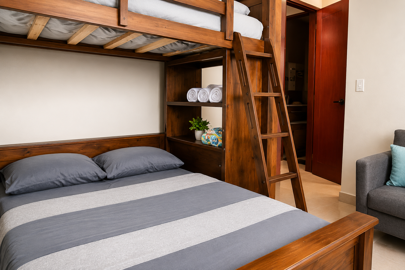 Bunk bed room with a double bed below, upper bunk and built-in shelving