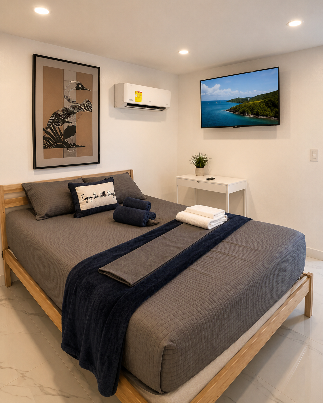 Private bedroom with a queen bed, air conditioning, smart TV and fresh linens